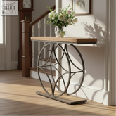 A sleek 120cm sofa table with light wood top and intricate circular metal frame perfect as an industrial sofa table