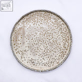 A 27 cm ribera handmade ceramics dinner plate with a speckled beige and gray textured stoneware surface