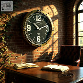 A vintage-style 40cm wall clock with a dark green face brass frame and bold white numerals requiring 1 aa battery