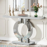 Silver mirrored console table with glittering glass top and circular base perfect for modern entryway use