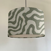 Green Wiggle drum lampshade /ceiling shade with a white lining