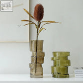 Tall stacked olive green costa glass vase with modern geometric design from a set of two costa glass vases