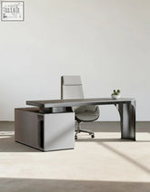 Modern gray abdi corner office desk with sleek metallic legs and sintered stone top with matching storage unit