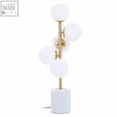 Abira brushed brass marble table lamp with frosted glass globes and white marble base for stylish lighting
