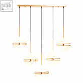 Gold-toned abira five ball brass pendant light with five frosted glass globes and metallic bands brass pendant light