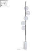Abira nickel and white marble floor lamp with a slender chrome pole and white marble base with five glass spheres