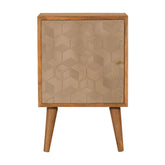 A mid-century modern Acadia bedside table with light wood frame and beige door embossed with hexagonal pattern