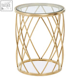 Ackley gold round side table with gold-finished metal frame and tempered clear glass top featuring geometric rods