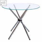 Afton round dining table with clear glass top and four angular chrome legs in a stylish cross base design