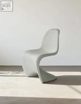 Aimee dining chair white plastic with sleek minimalist design and smooth molded body perfect dining chair