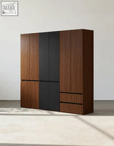 Modern wooden aisha door wardrobe with sleek black panel accent offering generous storage solutions in multiple sizes