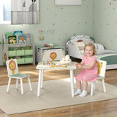 White kids table and chair set with lion design and light green accents kid-sized height for playroom use