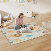 Aiyaplay double sided beige baby play mat with cartoon lions tigers teal leaves foldable safe space for indoor outdoor use