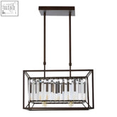 Bronze finished rectangular pendant light with clear crystal rods and exposed bulbs in a matte black ceiling design