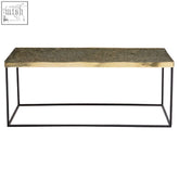 Modern rectangular gold coffee table with textured top and sleek black metal frame akola gold coffee table