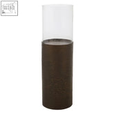 Akola small floor standing candle holder with a clear glass cylinder and antique gold textured dark bronze base