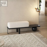 Alison stylish bench with a modern black frame and plush white boucle cushion on a spherical base stylish bench
