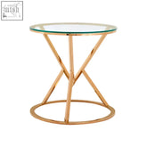 Allure corseted round rose gold end table with gold metal x-shaped base and clear glass top as a stylish rose gold end option