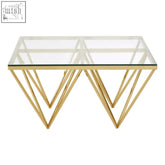 Allure gold finish coffee table with gold finish geometric metal legs and clear glass top