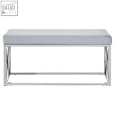 Silver upholstered bench with sleek chrome frame featuring light blue velvet seating for stylish comfort