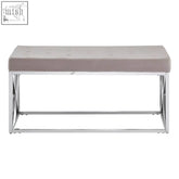 A sleek allure mink tufted bench with a soft taupe velvet seat and shiny chrome metal frame perfect for modern spaces