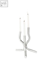 Silver metallic aluminium mini candelabra with three slender curved arms holding white candles