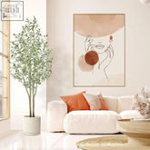 Tall artificial olive tree with lifelike fruits and natural wood trunk in a sleek white pot for indoor outdoor use