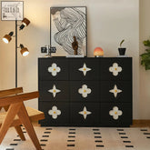 Black amalia narrow sideboard with white quatrefoil handles and gold knobs featuring art deco style design