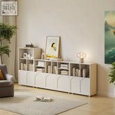 White amir modular bookshelf with arched panel doors and open shelving units featuring stainless steel accents