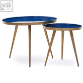 Amira blue enamel nest of two tables with blue enamel tops and gold-tone metal legs perfect for compact spaces