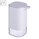 Ando white acrylic lotion dispenser with white plastic pump and clear glass base in a sleek minimalist design