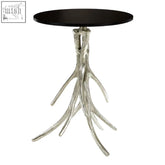 Silver antler round side table with a smooth black marble top and sleek black circular surface