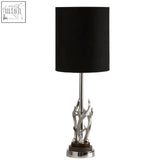 Silver antler table lamp with marble base and black cylindrical shade perfect for cozy lighting and decor