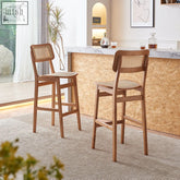 Two anya bar stools with woven rattan seats and solid wood natural finish perfect for home bars