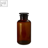 Apothecary extra small amber glass bottle with black screw-top cap perfect for storing liquids safely