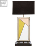 Modern geometric arbus table lamp with black rectangular shade and silver frame featuring yellow pink and white panels