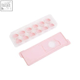 Arctic pink ice cube tray with pink plastic base and clear lid perfect for making small ice cubes