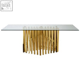 Arezzo tempered glass dining table with gold finish frame and vertical slat metal base for stylish dining rooms