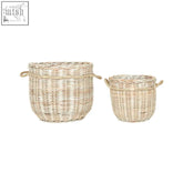 Two natural-toned argento whitewash baskets in rattan with woven pattern and sturdy handles for storage use