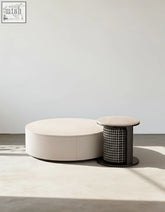 Cream-colored oval marble coffee table with a sleek design and subtle seam detail from aria coffee table offers set