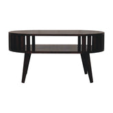 Dark wood ariella california walnut coffee table with oval top lower shelf and vertical slats on the sides