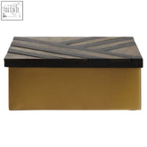 Aris large black and gold storage box with a gold rectangular base and a black lid featuring diagonal textured stripes