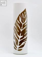 White cylindrical glass vase with nature inspired brown leaf design hand painted for home decor and interior design