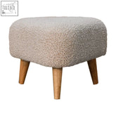 Beige mud boucle ottoman with tapered solid mango wood legs from artisan furniture perfect for living room seating