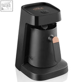 Black Arzum Okka Jet automatic Turkish coffee machine with matte finish and rose gold accent on handle