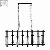 Black metal pendant light with clear glass candle holders and matte black finish chain suspension from Aspen Iron and Glass