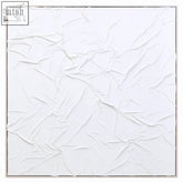 Astratto white hand painted wall art with white textured fabric and crinkled surface in a thin silver frame