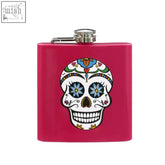 Auden pink hip stainless steel flask with vibrant pink color and colorful sugar skull floral design with blue eyes