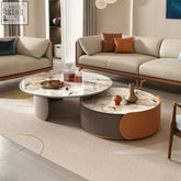 Modern two-tier coffee table with sintered stone marble top and curved legs in beige and orange tones perfect for living rooms
