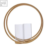 Aura large gold finish double candle holder with gold-toned circular frame and two clear glass holders